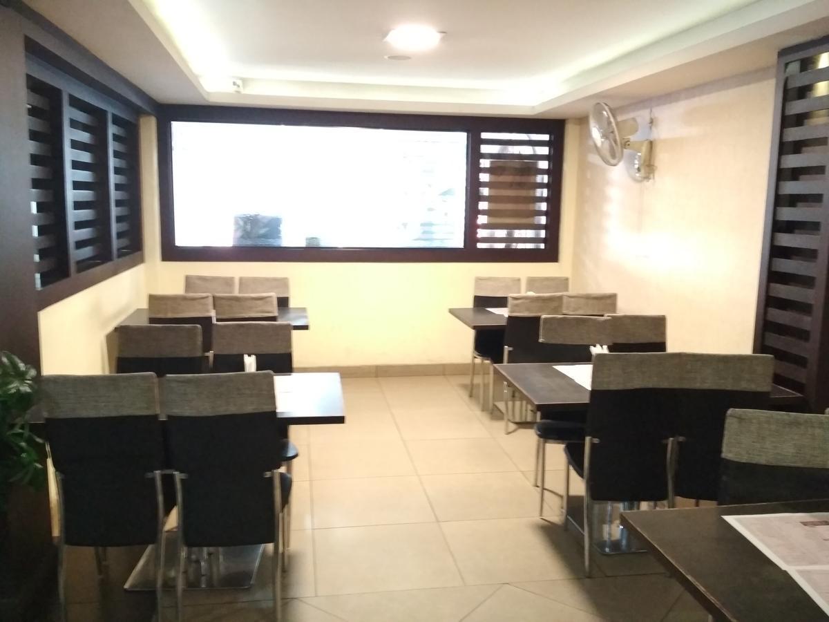 Hotel Rukmini Alwaye Экстерьер фото